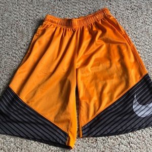 Youth orange nike shorts in great condition size large